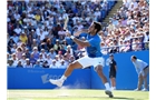 EASTBOURNE, ENGLAND - JUNE 21:  Feliciano Lopez of Spain returns against Richard Gasquet of France during their Men's Singles Finals match on day eight of the Aegon International at Devonshire Park on June 21, 2014 in Eastbourne, England. (Photo by Jan Kruger/Getty Images)